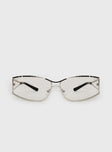 Silver-toned sunglasses Metal frame, silver tinted lenses, silicone nose pads, thick temples, black detail tip temples