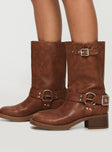 Boots on design, silver-toned buckles, rounded toe, padded footbed