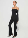Jumpsuit Off-the-shoulder style, inner silicone strip at bust, flared sleeves with split, frill detail at bust, flared leg Good stretch, fully lined  Princess Polly Lower Impact 