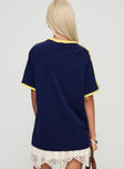 Graphic tee  Relaxed fit, oversized sleeves, v-neckline  Good stretch, unlined 