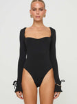 Long sleeve bodysuit Sweetheart neckline, flared sleeves, high cut leg, cheeky style bottom, press clip fastening at base Good stretch, fully lined 