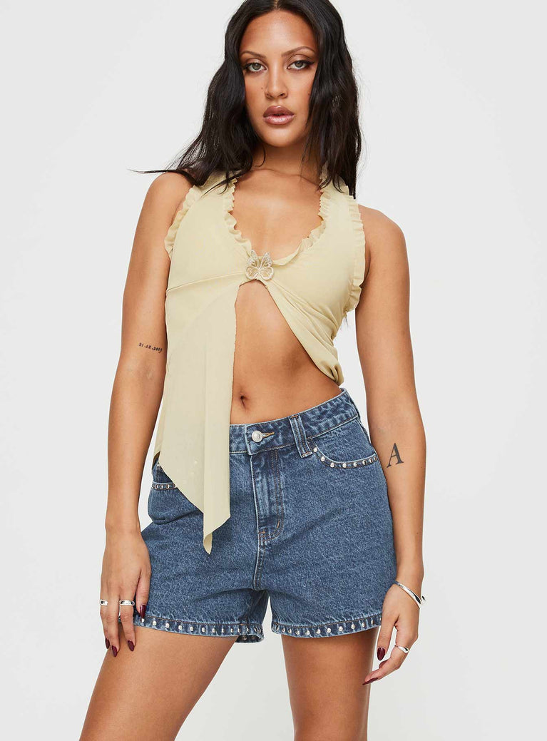 Denim shorts High rise fit, silver studded detailed, classic five pocket design, belt loops at waist, zip and button fastening, branded patch at back