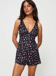 Floral romper V-neckline, slight ruching at bust, invisible zip and tie fastening at back