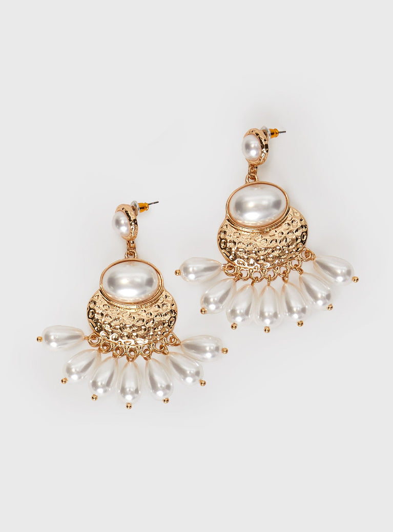 Earrings Drop charm design, pearl details, gold-toned hardware Stud fastening