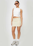 Cream denim mini skirt Belt looped waist, zip fastening at side, four-pocket design