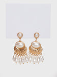 Earrings Drop charm design, pearl details, gold-toned hardware Stud fastening