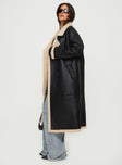 Longline coat Lapel collar, long sleeves, shearling cuffs & detail, single button fastening at cuff, twin hip pockets, double-breasted front 