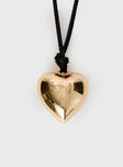 Gold-toned necklace Heart pendant, adjustable tie fastening