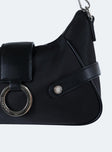 Black shoulder bag Removable shoulder strap Zip and magnetic button fastening  Silver-toned hardware Internal zip pocket and card slip Flat base
