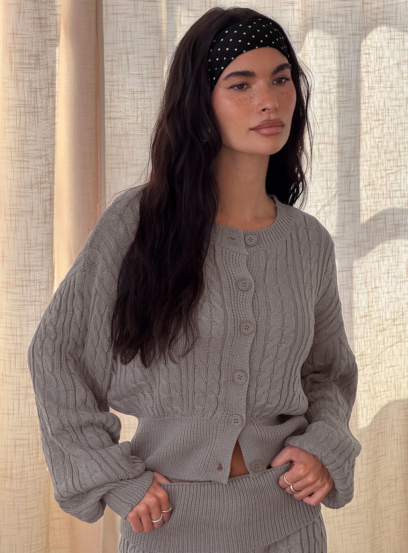 back view of model wearing Princess Polly Baleigh Cable Knit Cardigan Grey 