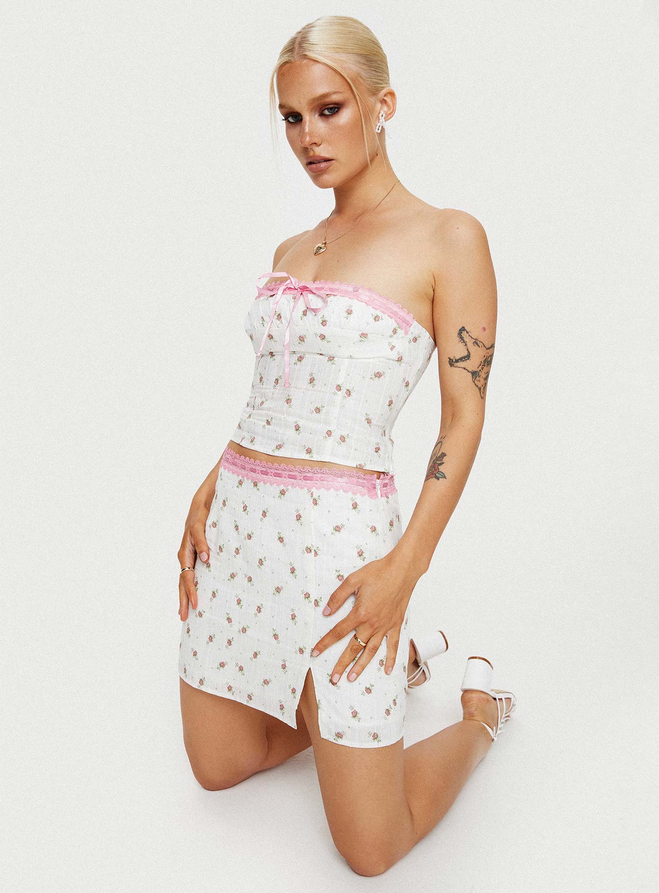 Pink and white floral mini skirt