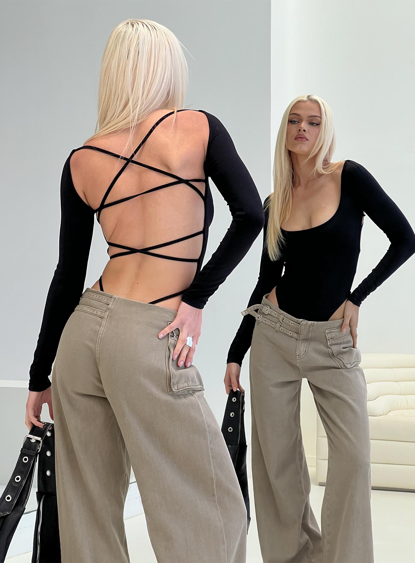 back view of model wearing Princess Polly All Tied Up Long Sleeve Bodysuit Black Long Sleeve Tops 