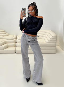 side view of model wearing Princess Polly Scheana Low Rise Jeans Steel Grey Mid Rise 