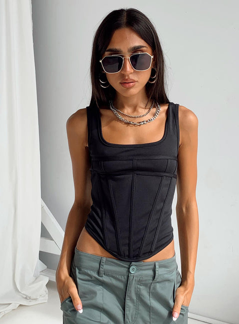 front view of model wearing Princess Polly Normani Top Black Sleeveless Square Neck 