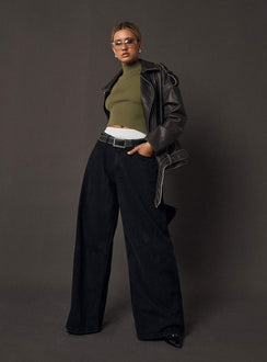 side view of model wearing Princess Polly Naylor Wide Leg Jeans Washed Black Denim Petite High Waisted 