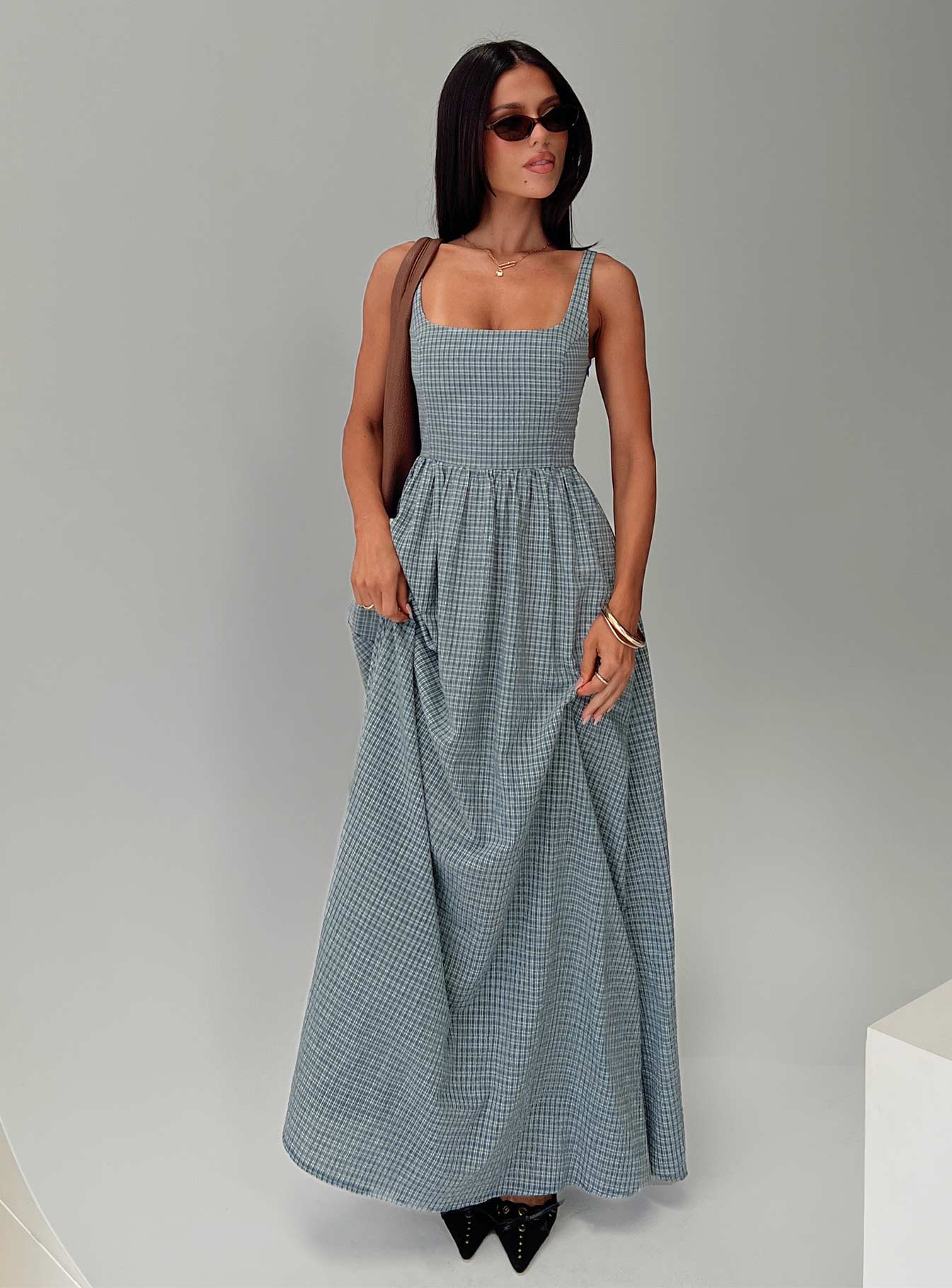 side view of model wearing Princess Polly Cartmel Check Maxi Dress Navy Square Neck 