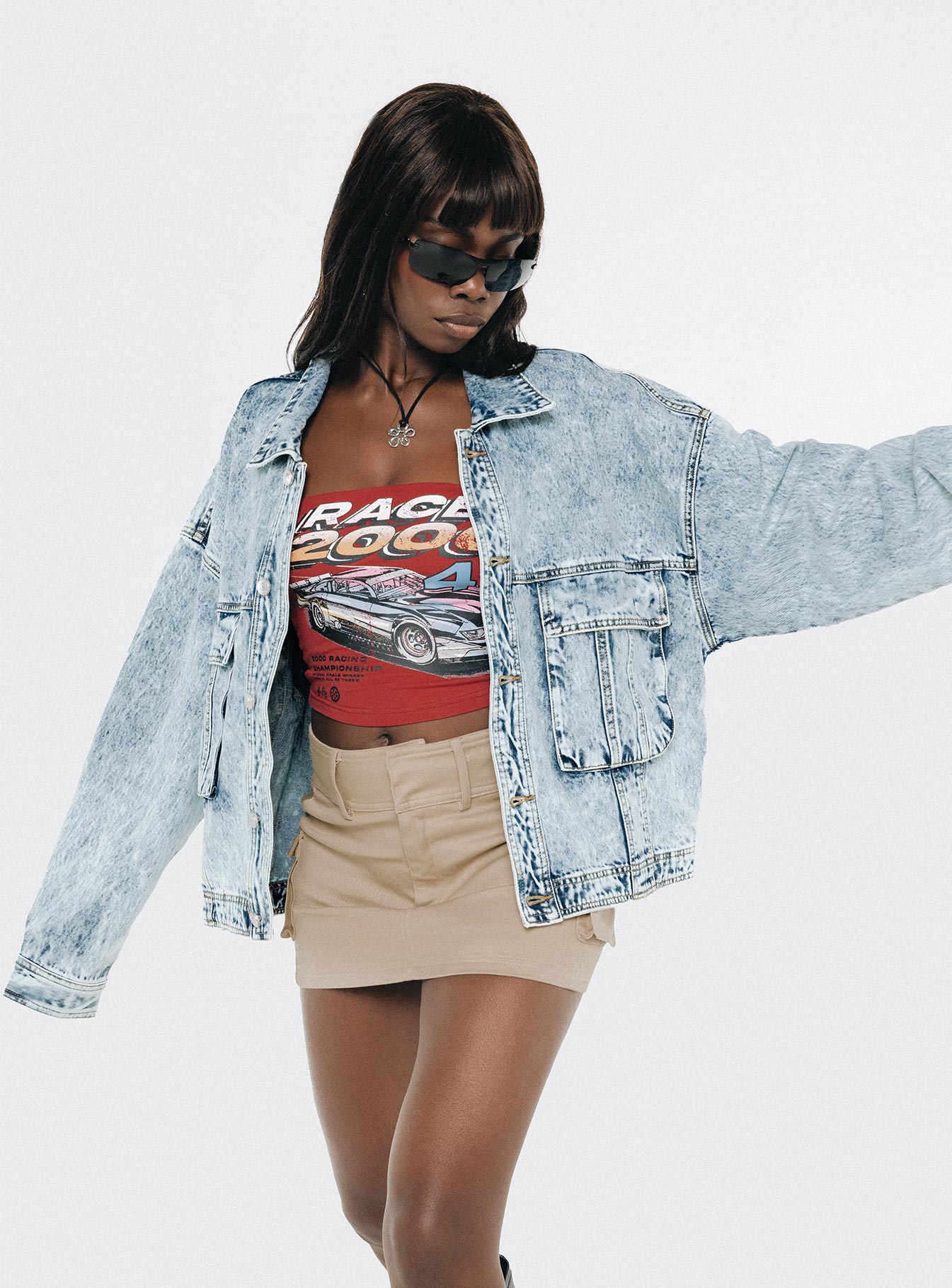 Oversized light wash denim jacket  Classic collar, drop shoulder, button fastening at front, oversized chest pocket, single button cuff