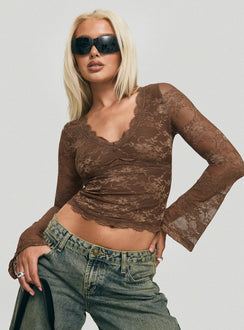 front view of model wearing Princess Polly Pitter Long Sleeve Top Brown Full Sleeves V-Neck 