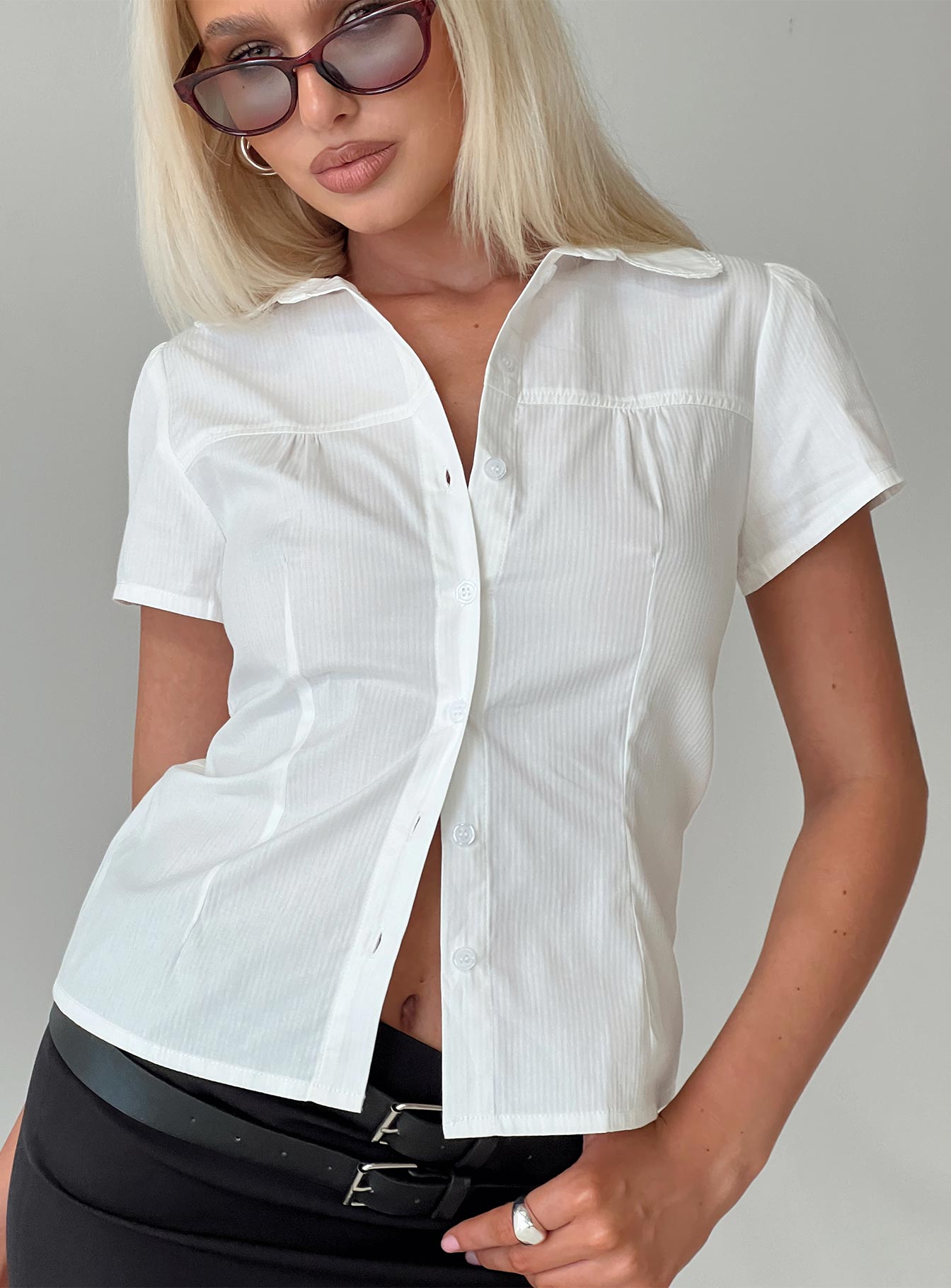 front view of model wearing Princess Polly Reverie Top White Short Sleeves V-Neck 