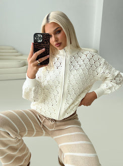 front view of model wearing Princess Polly Sirena Zip Through Knit Sweater Cream 