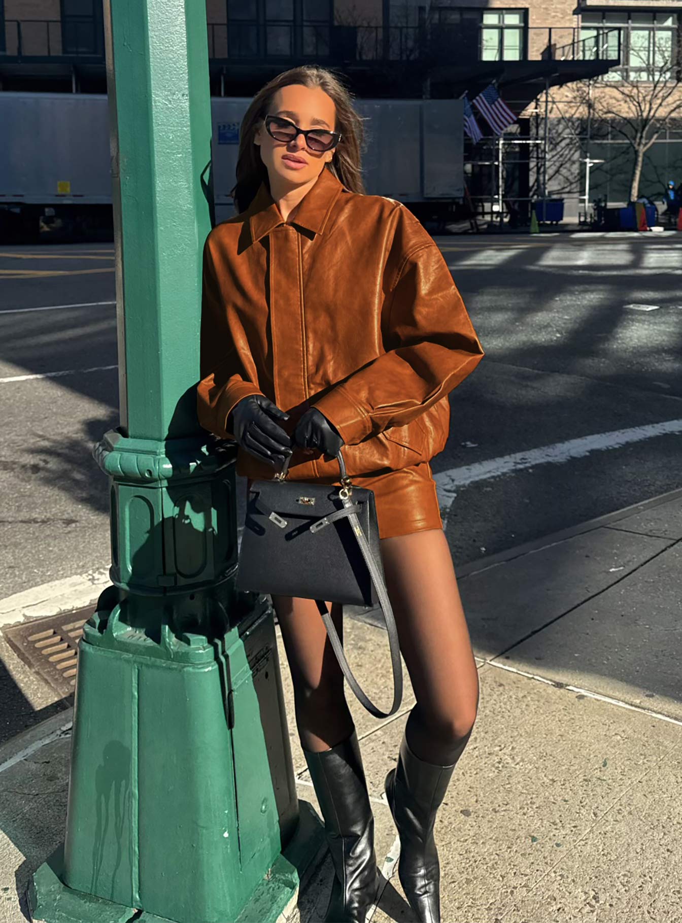 Faux leather bomber jacket Classic collar, zip & button fastening down front, twin hip pockets with press button fastening, elasticated waistband, single button cuff Non-stretch material, fully lined