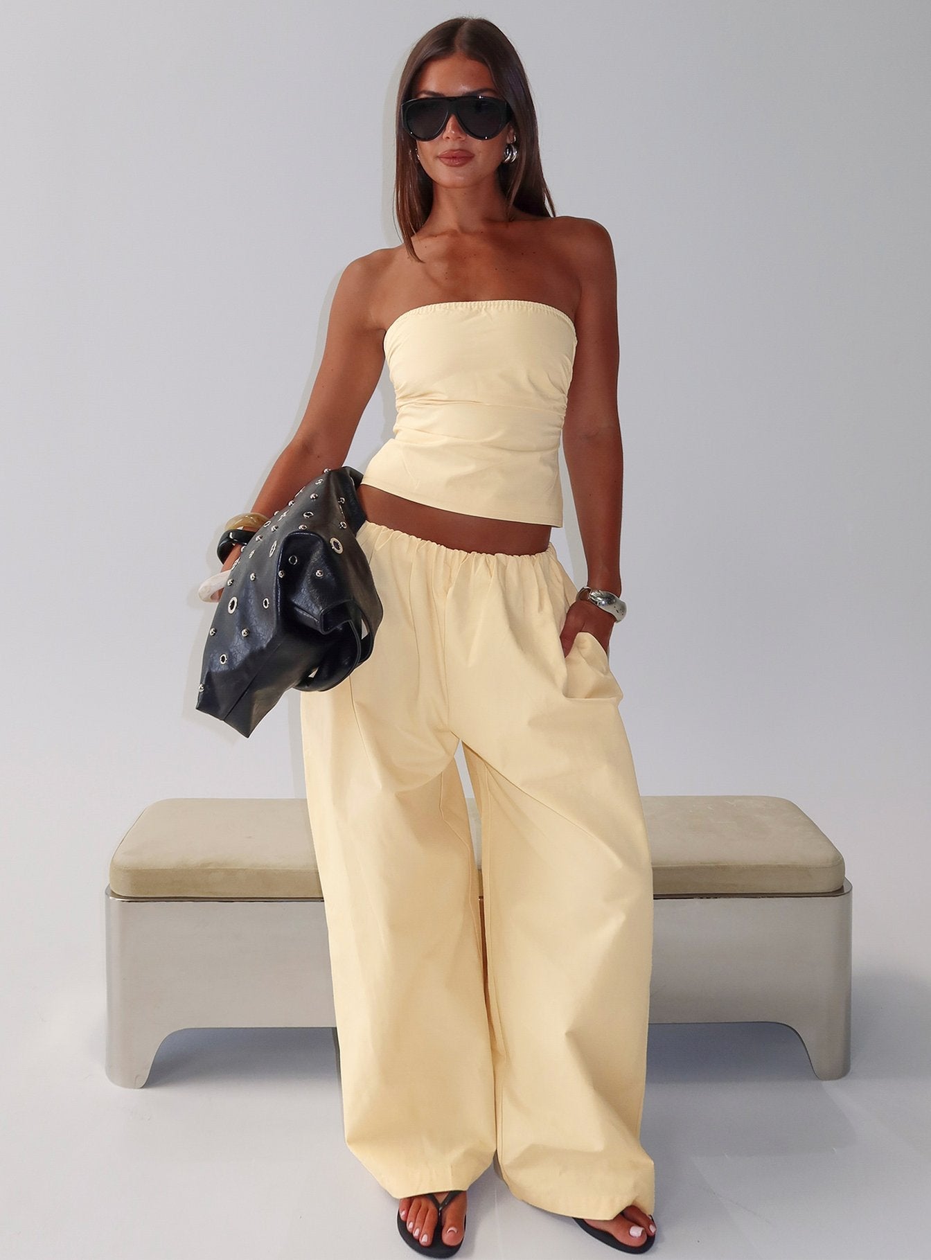 front view of model wearing Princess Polly Tidekiss Pants Lemontini Mid Rise Pants 