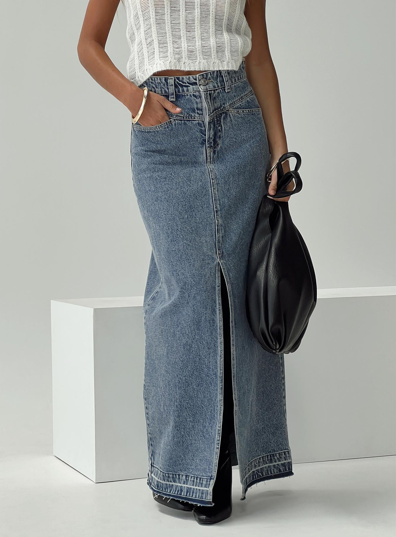   front view of model wearing Princess Polly Deneuve Denim Maxi Skirt Mid Wash Maxi 