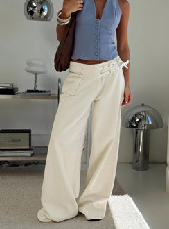 front view of model wearing Princess Polly Paltrow Mid Rise Wide Leg Cargo Jeans Cream Petite Low Rise Jeans 