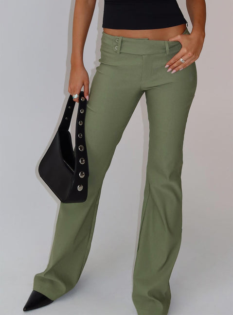 side view of model wearing Princess Polly Kinkirk Flared Pants Olive Green Low Rise Pants 
