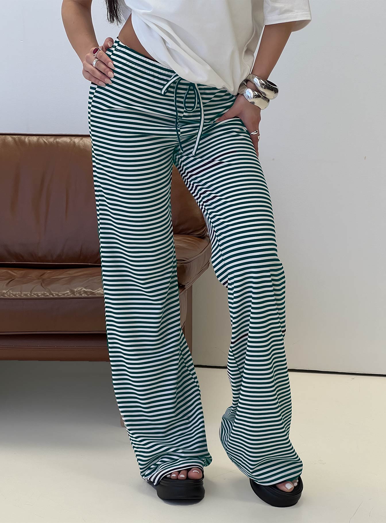 front view of model wearing Princess Polly Alfreda Jersey Pant Navy Stripe High Waisted Pants 