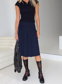   side view of model wearing Princess Polly Elaila Pleat Midi Skirt Navy Midi Skirts Skirts 