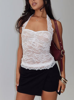 front view of model wearing Princess Polly For The Thrill Skort Black Low Rise Shorts 