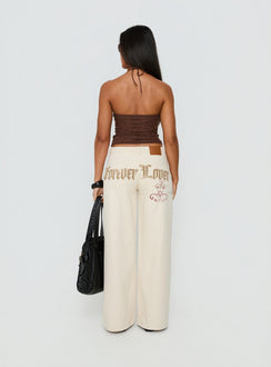 back view of model wearing Princess Polly Than Forever Love Graphic Denim Jeans Cream Low Rise Jeans Jeans 