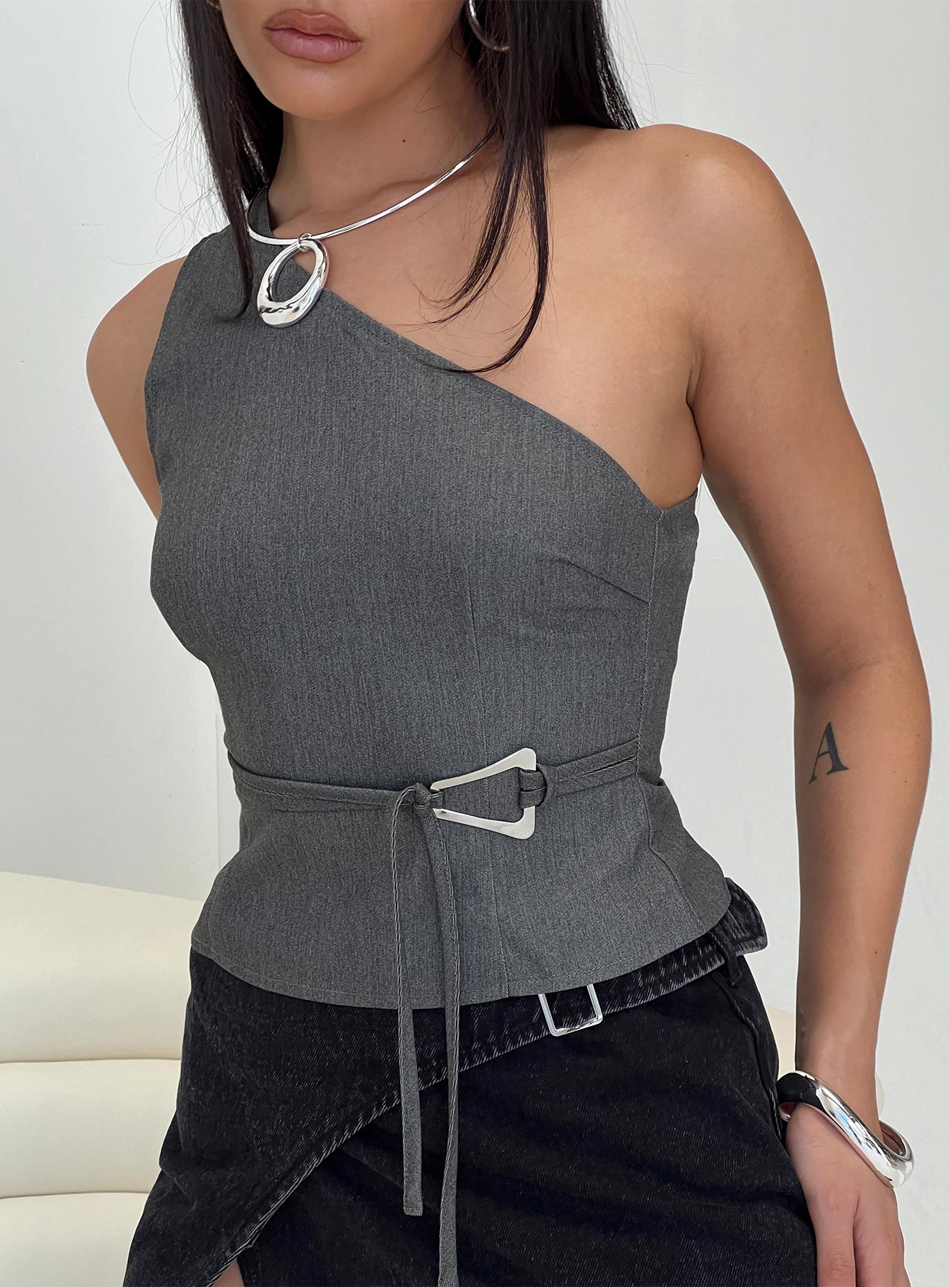 back view of model wearing Princess Polly Sayaka Top Charcoal Sleeveless Asymmetric Neckline 