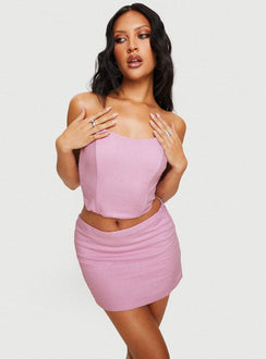 Two piece set Corset top, sweetheart neckline, boning through front, inner silicone strip at bust, shirred band at back, curved hem Mid-rise mini skirt, invisible zip fastening at side