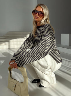 side view of model wearing Princess Polly Bloom Long Sleeve Top Beige Stripe Full Sleeves Crew Neck 