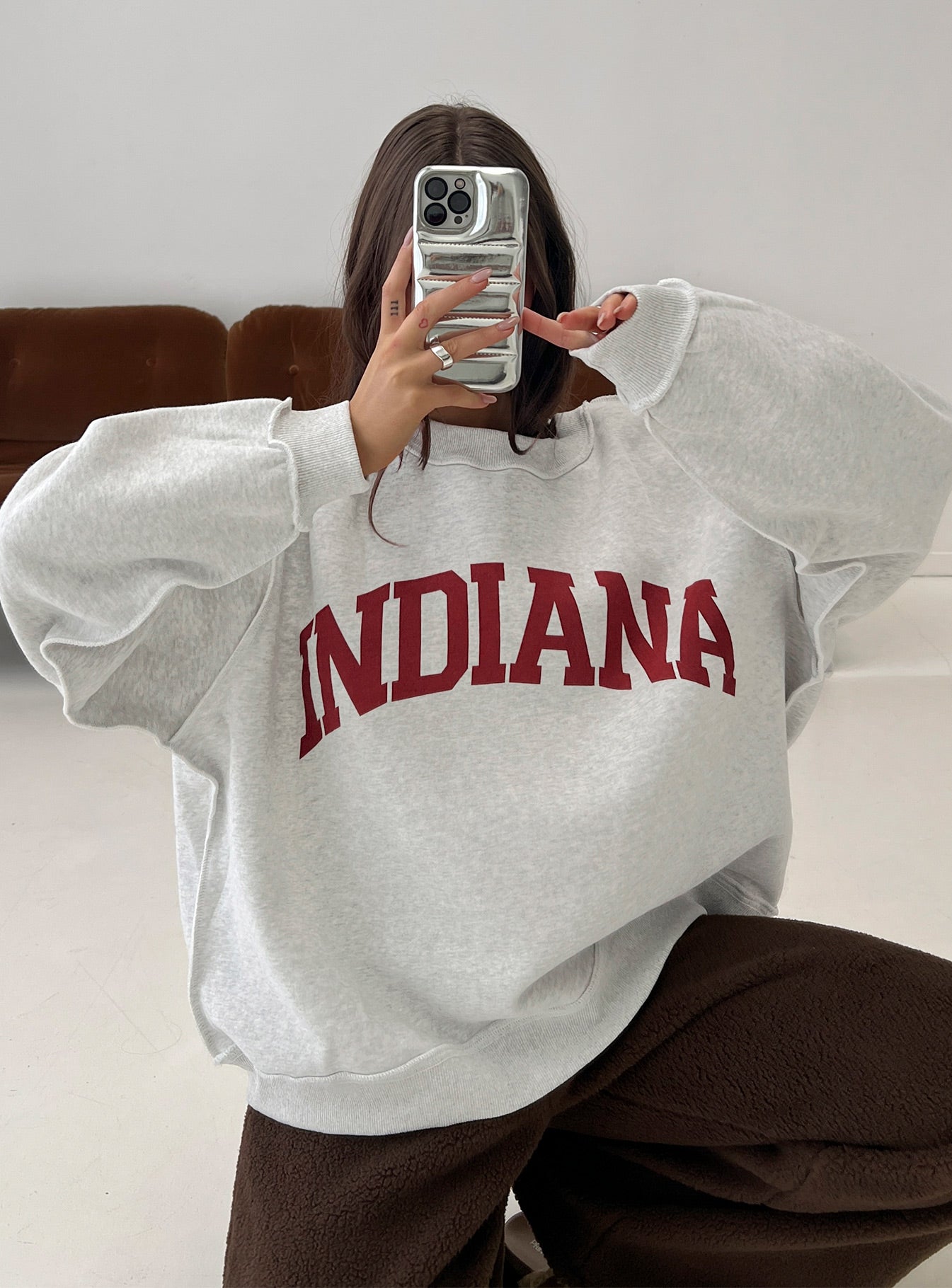 side view of model wearing Princess Polly When In Indiana Jumper Grey 