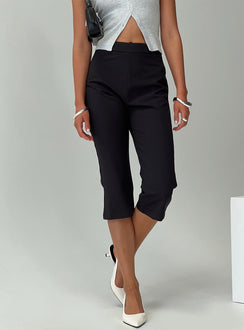 front view of model wearing Princess Polly Meadowlark Capri Pants Black High Waisted Pants 