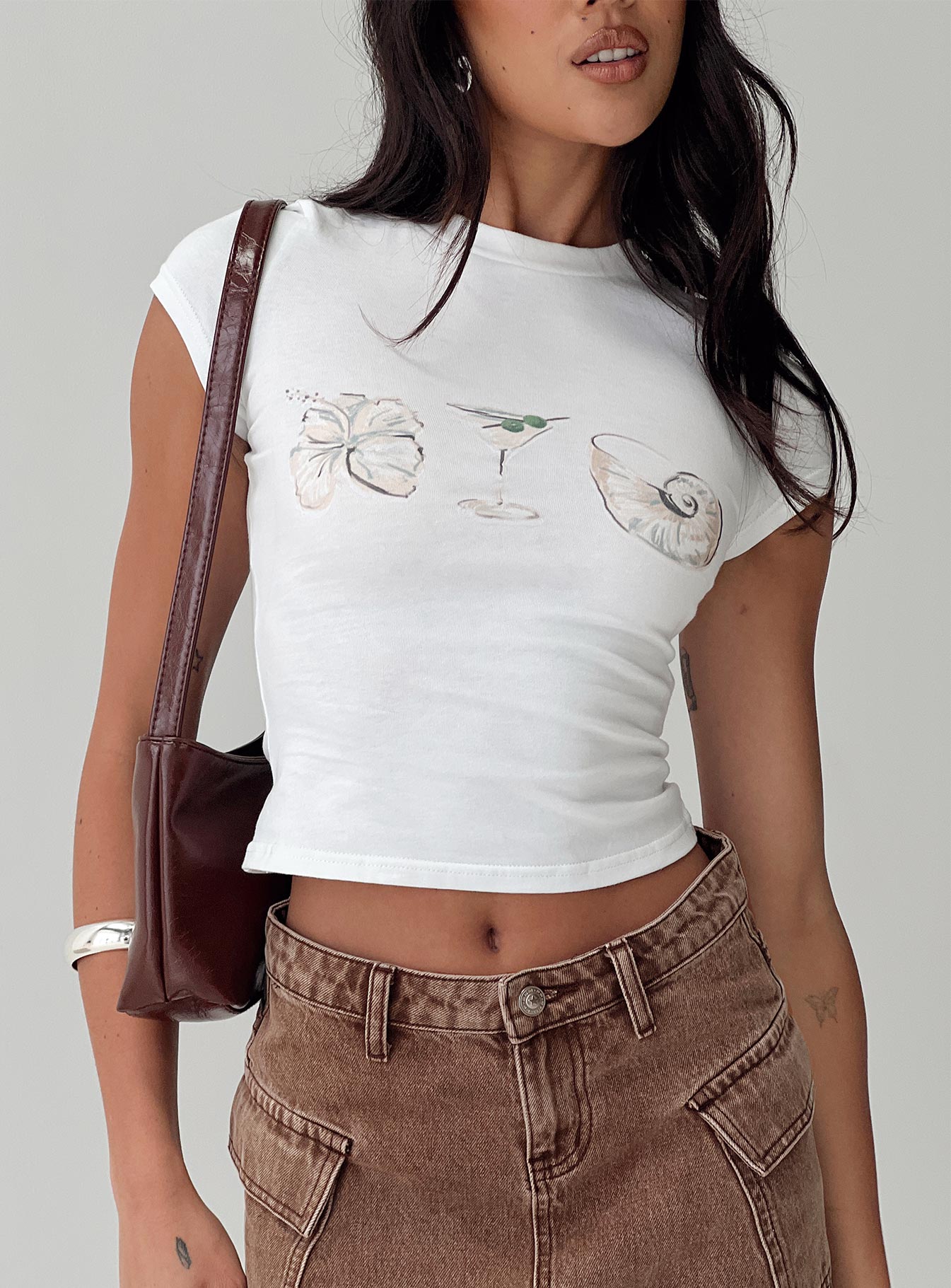 back view of model wearing Princess Polly Odyssey Tee White Sleeveless Crew Neck 