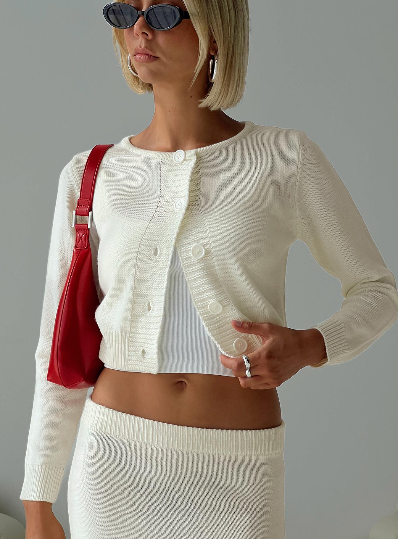 front view of model wearing Princess Polly Collase Knit Sweater Cream cropped 