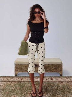 front view of model wearing Princess Polly Samaira Capri Pant Cream Polka Dot Mid Rise Pants 
