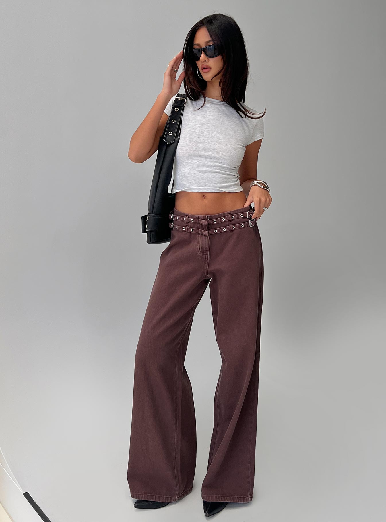 front view of model wearing Princess Polly Baccarat Belted Pant Chocolate Mid Rise 
