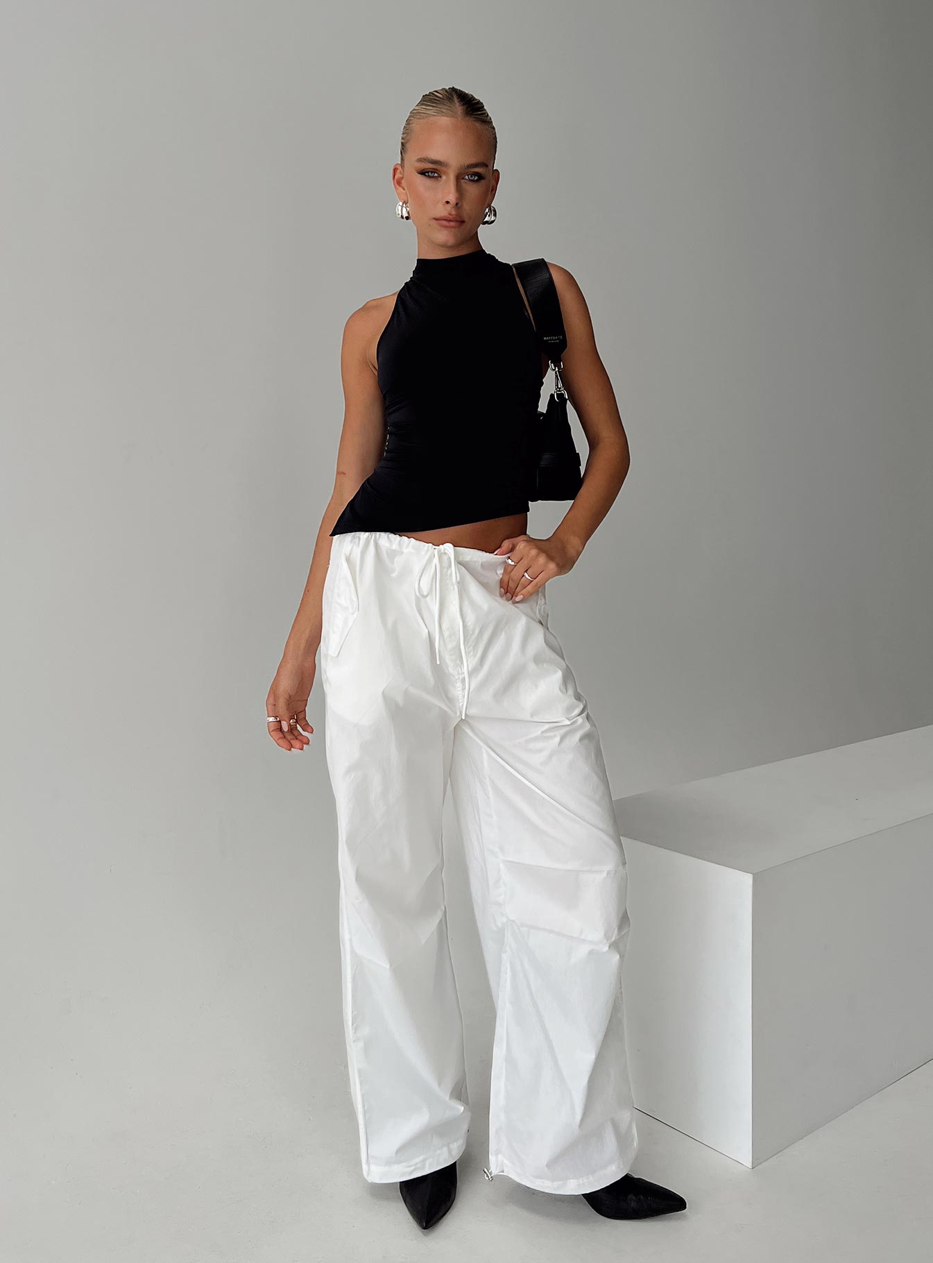 front view of model wearing Princess Polly Blessings Tie Front Cotton Pant White Low Rise Pants 