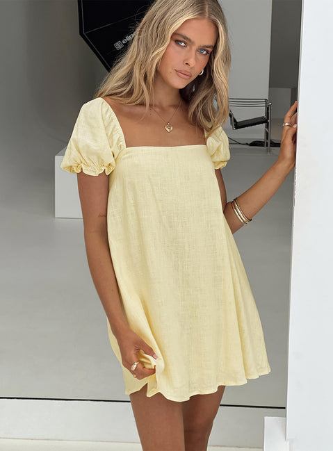 side view of model wearing Princess Polly Beyond Linen Blend Mini Dress Yellow Square Neck 