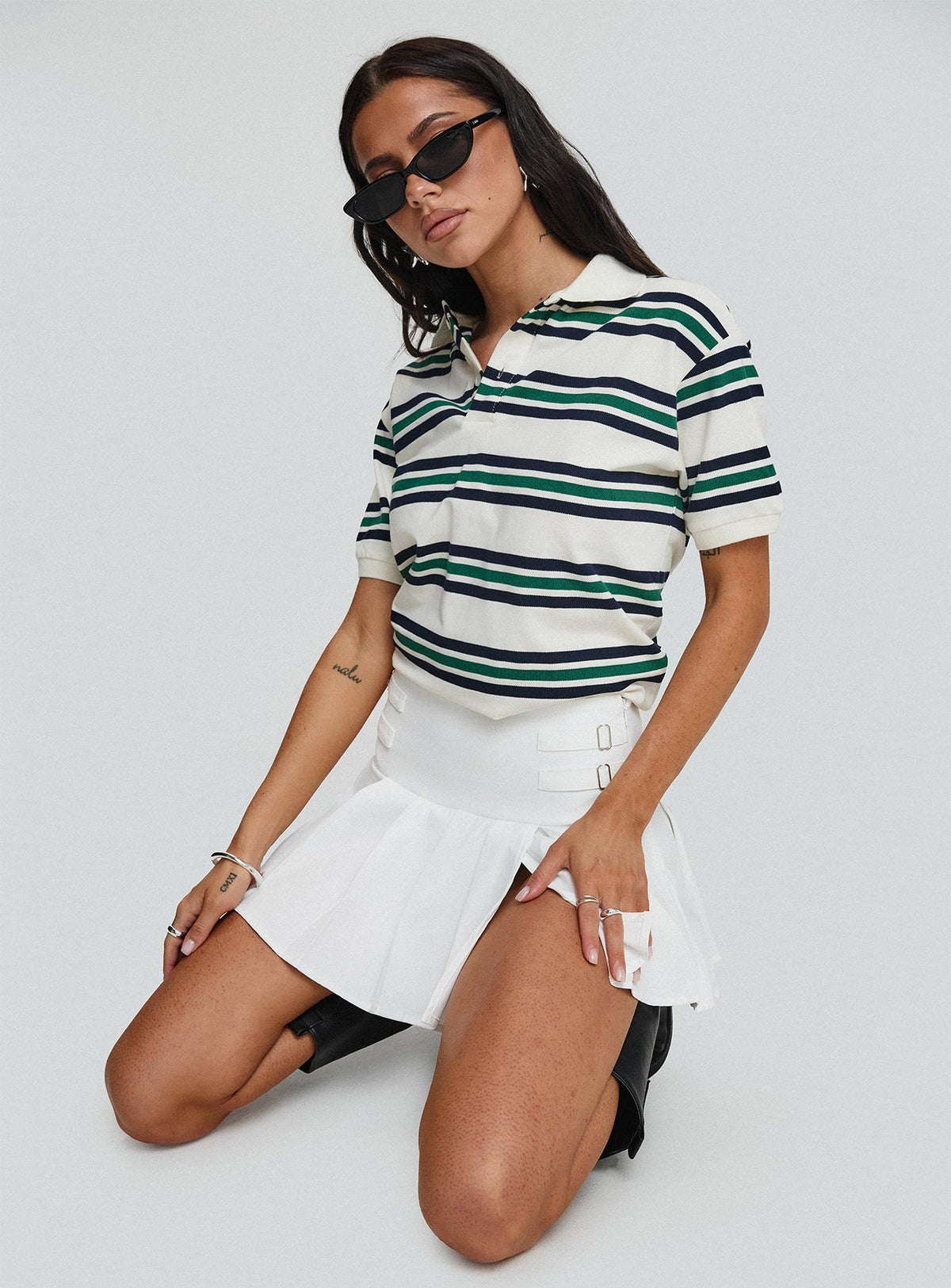   side view of model wearing Princess Polly Cartwright Mini Skirt White Mini Skirts Skirts 