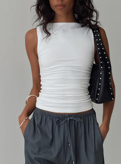 front view of model wearing Princess Polly Solani Top White Sleeveless High Neck 