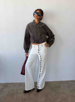 Showcasing the Penny Mid Rise Straight Leg Jeans White in womens-jeans with mid-rise front view of model wearing Princess Polly