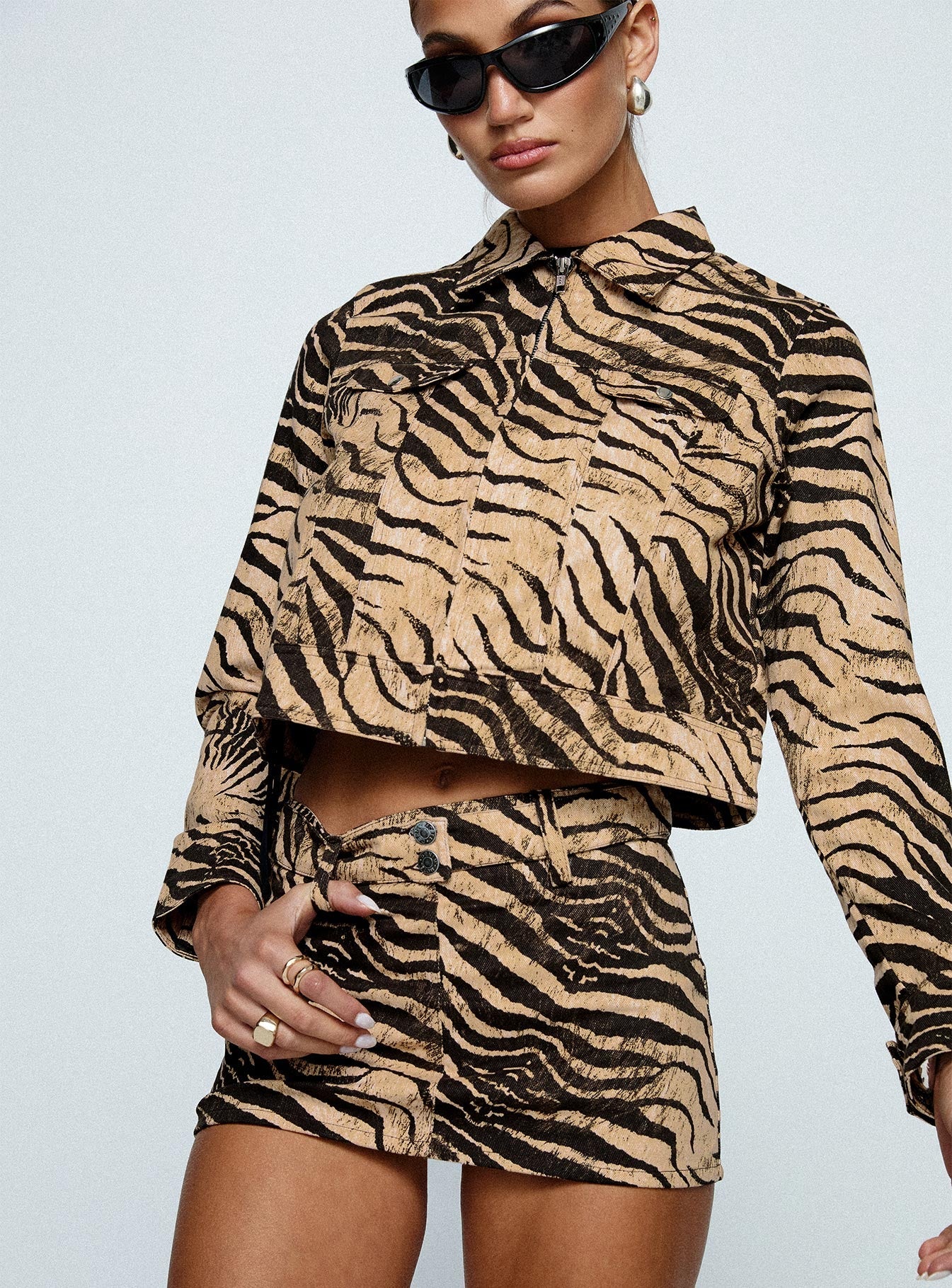   side view of model wearing Princess Polly Oiwa Skirt Multi Mini Skirts 