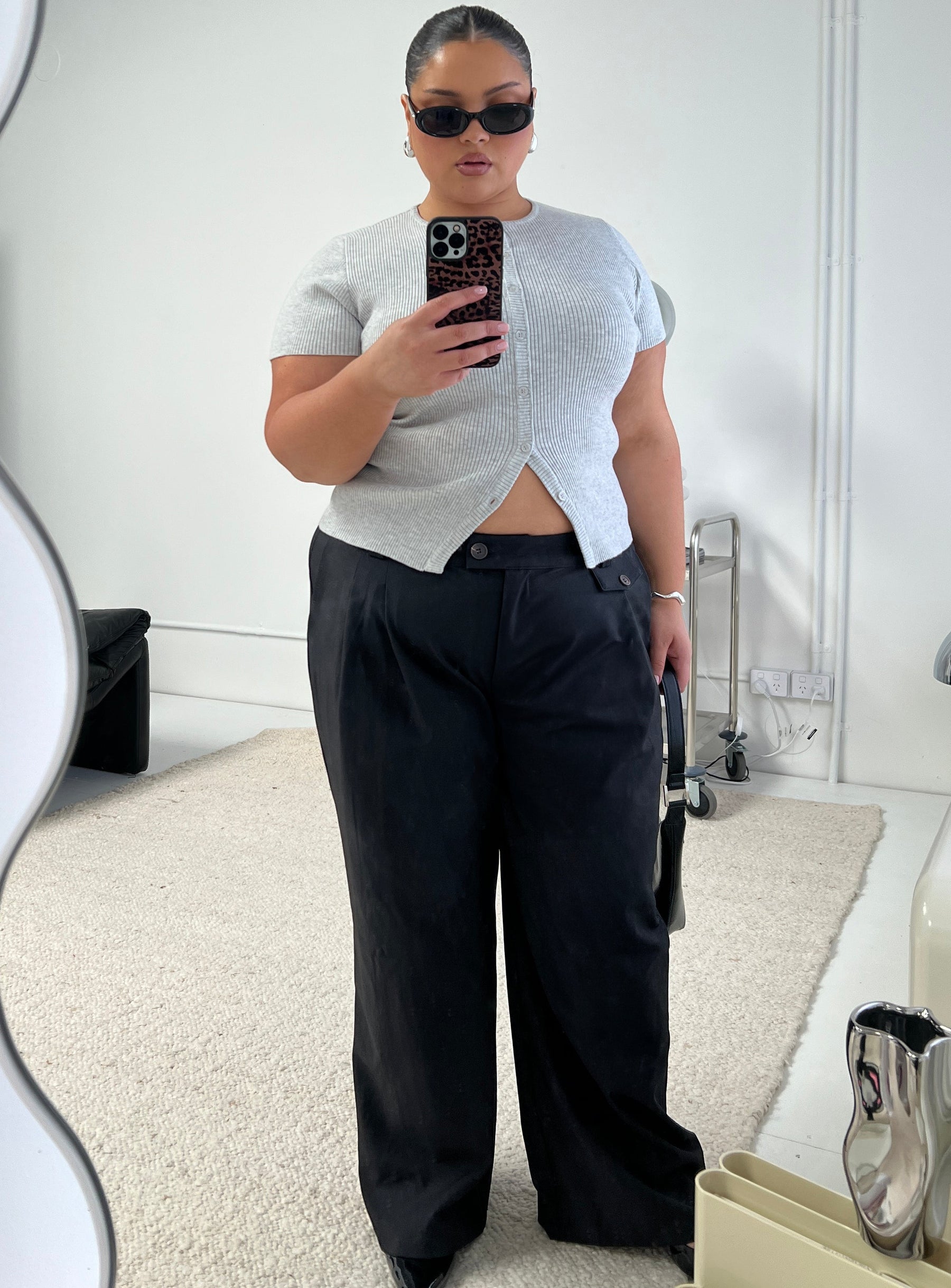 front view of model wearing Princess Polly Sallon Low Rise Pants Black Low Rise Pants 