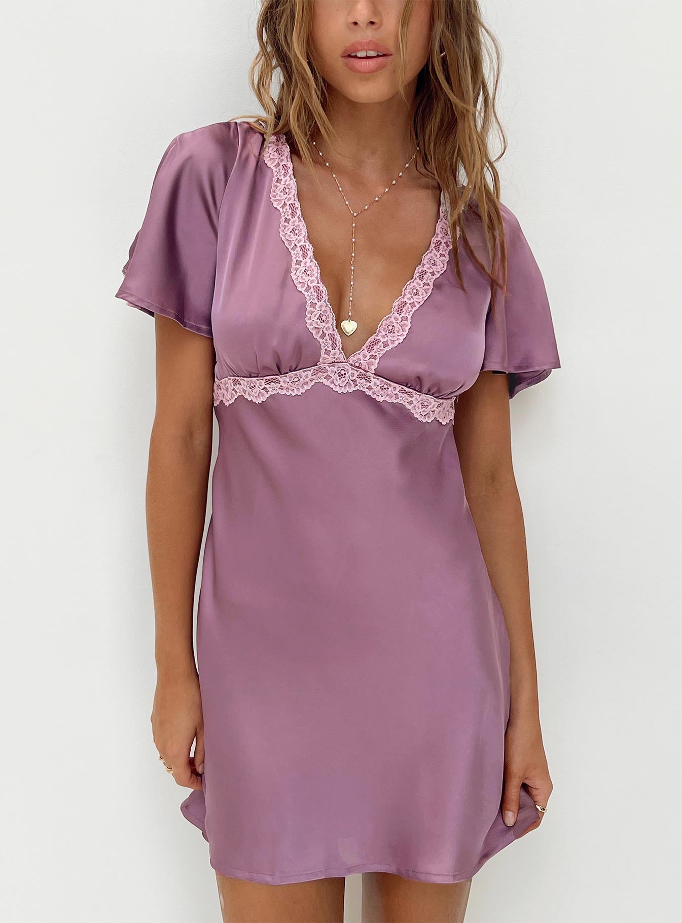 Front view of model wearing  front Princess Polly V-Neck  Jaron Mini Dress Mauve